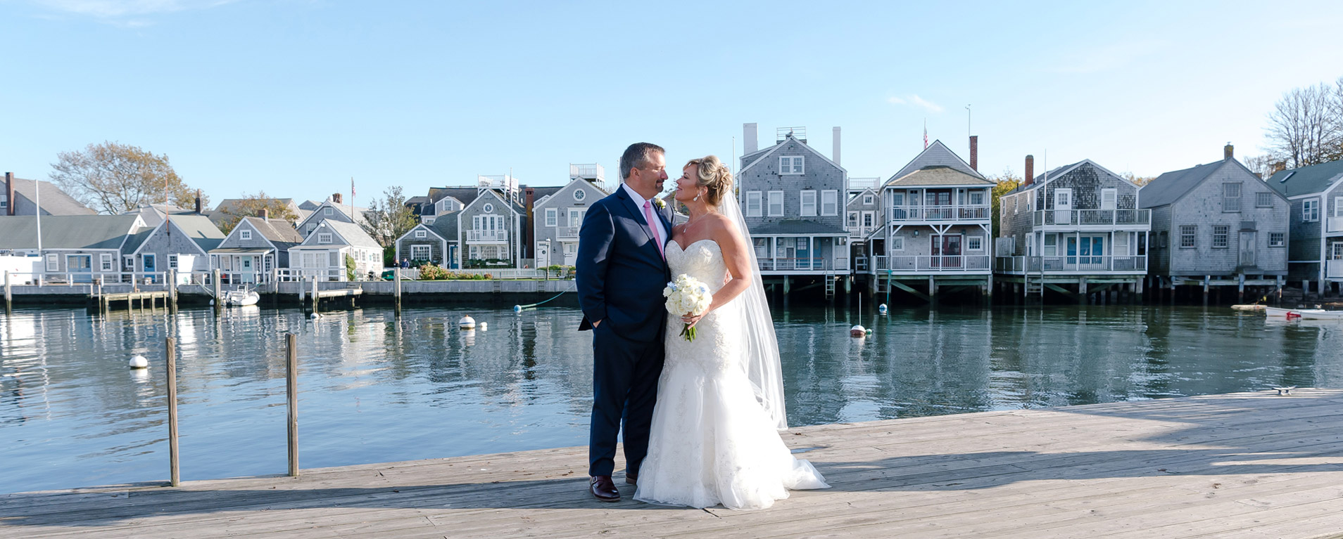 bride and groom outdoors by the water by Nantucket Wedding Photographer
